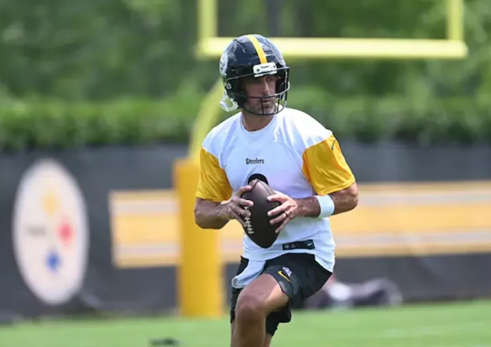 Pittsburgh Steelers quarterback Aaron Rodgers (8) drops back to pass during minicamp at their South Side facility. Mandatory Credit: Philip G. Pavely-Imagn Images/File Photo