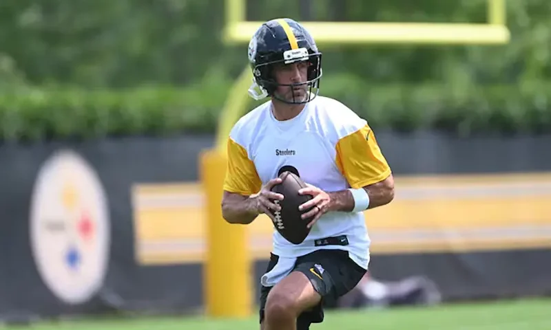 Pittsburgh Steelers quarterback Aaron Rodgers (8) drops back to pass during minicamp at their South Side facility. Mandatory Credit: Philip G. Pavely-Imagn Images/File Photo