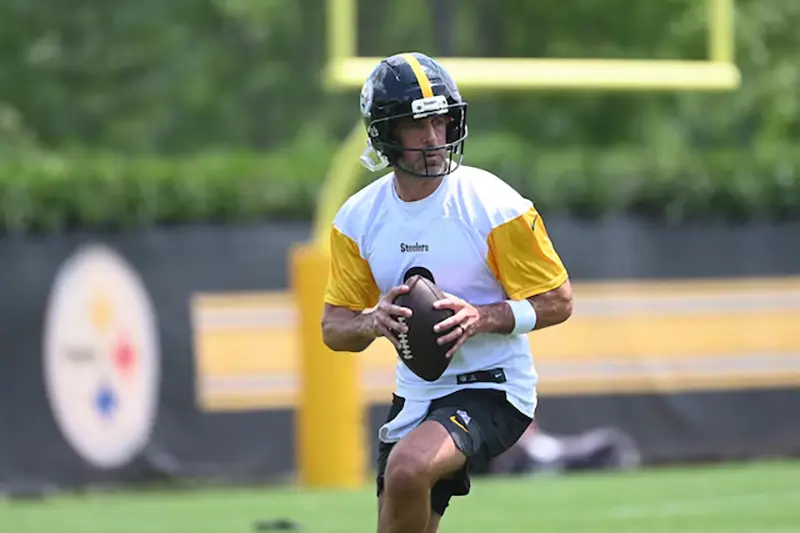 Pittsburgh Steelers quarterback Aaron Rodgers (8) drops back to pass during minicamp at their South Side facility. Mandatory Credit: Philip G. Pavely-Imagn Images/File Photo