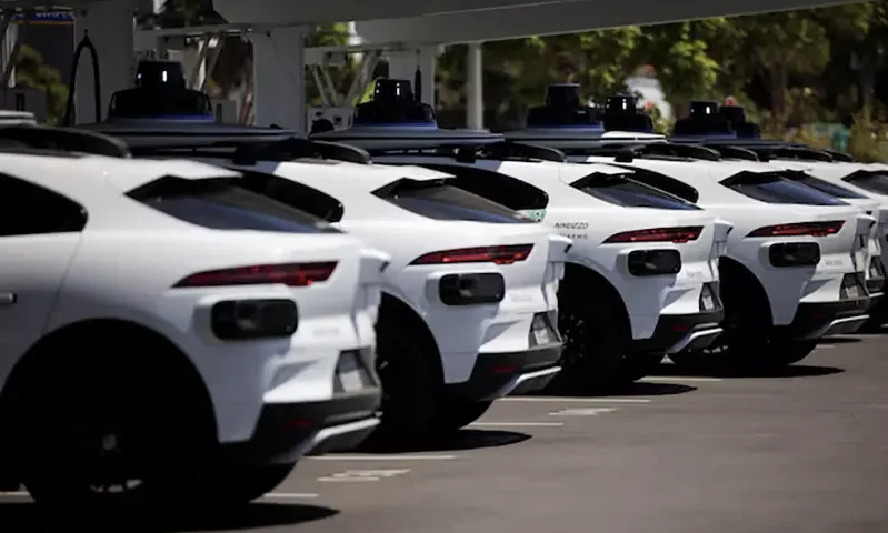 Waymo driverless vehicles charge at a Waymo charging station in Santa Monica, California, U.S., May 30, 2025. REUTERS/Daniel Cole/File Photo
