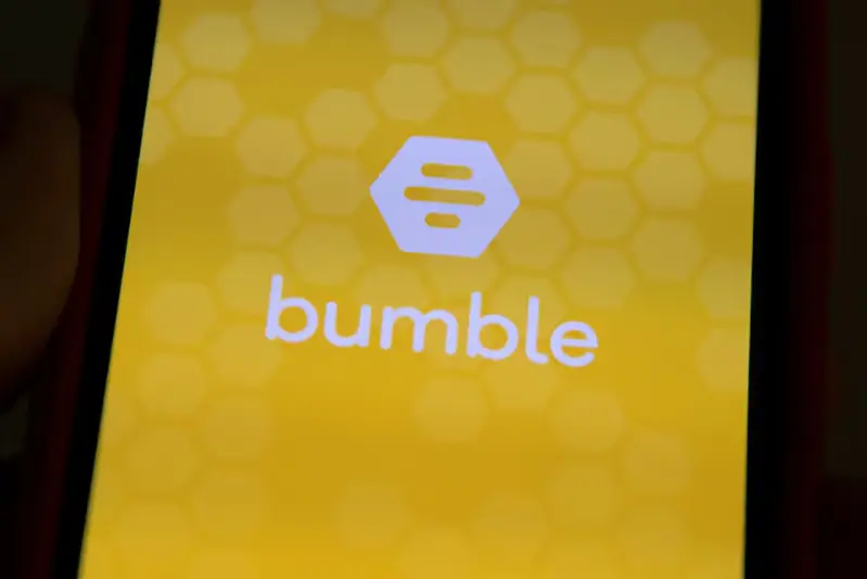 The Bumble Inc. (BMBL) app is shown on an Apple iPhone in this photo illustration as the dating app operator made its debut IPO on the Nasdaq stock exchange February 11, 2021. REUTERS/Mike Blake/Illustration
