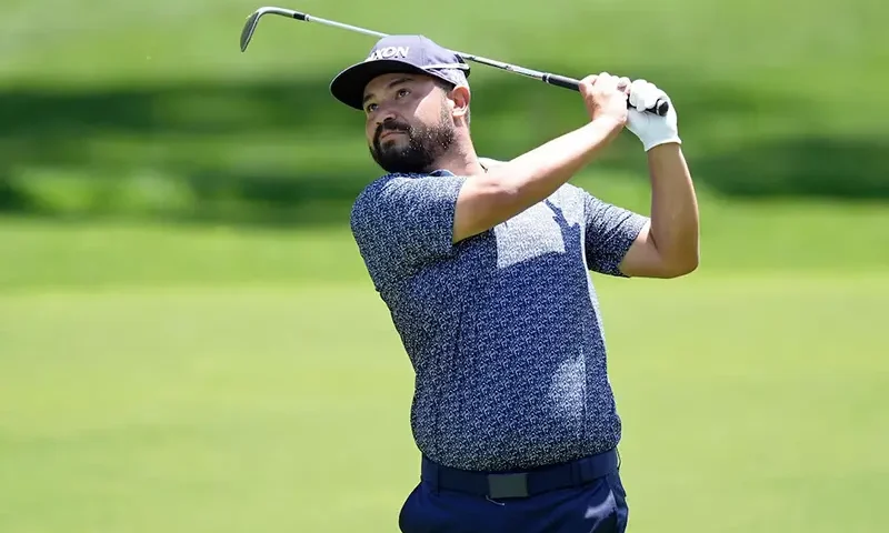 J.J. Spaun takes a shot on the second hole during the third round of the PGA Championship golf tournament at Quail Hollow. Mandatory Credit: Jim Dedmon-Imagn Images/File Photo