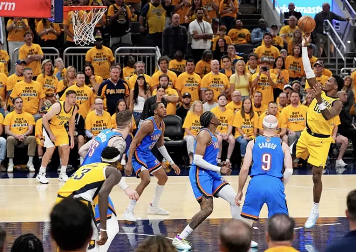 Indiana Pacers guard Bennedict Mathurin (00) shoots the ball against Oklahoma City Thunder guard Alex Caruso (9) in game three of the 2025 NBA Finals at Gainbridge Fieldhouse. Mandatory Credit: Kyle Terada-Imagn Images