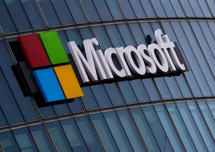 A view shows a Microsoft logo at Microsoft offices in Issy-les-Moulineaux near Paris, France, March 21, 2025. REUTERS/Gonzalo Fuentes/File Photo