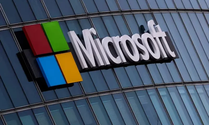 A view shows a Microsoft logo at Microsoft offices in Issy-les-Moulineaux near Paris, France, March 21, 2025. REUTERS/Gonzalo Fuentes/File Photo