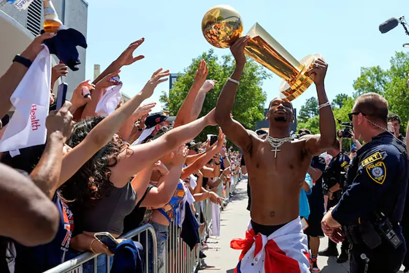 Oklahoma City Thunder guard Shai Gilgeous-Alexander carries the Larry O'Brien trophy as he celebrates with fans as the Oklahoma City Thunder celebrate their first NBA Finals title win with a champions parade throughout downtown Oklahoma City on Tuesday, June 24, 2025. Mandatory Credit: Bryan Terry/USA TODAY NETWORK via Imagn Images/File Photo