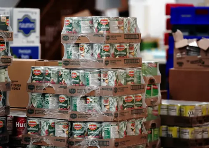 Del Monte canned tomatoes are seen among other nonperishable goods inside the West CAP Food Pantry in Boyceville, Wisconsin, U.S., October 22, 2020. REUTERS/Bing Guan/File Photo