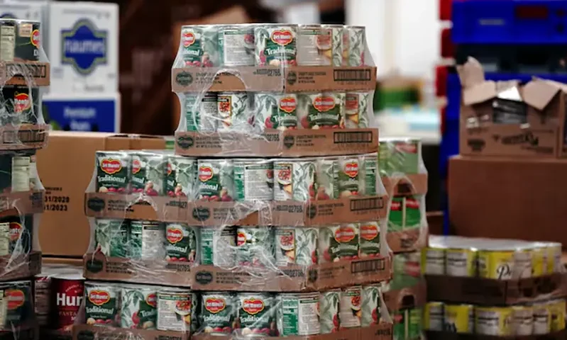 Del Monte canned tomatoes are seen among other nonperishable goods inside the West CAP Food Pantry in Boyceville, Wisconsin, U.S., October 22, 2020. REUTERS/Bing Guan/File Photo