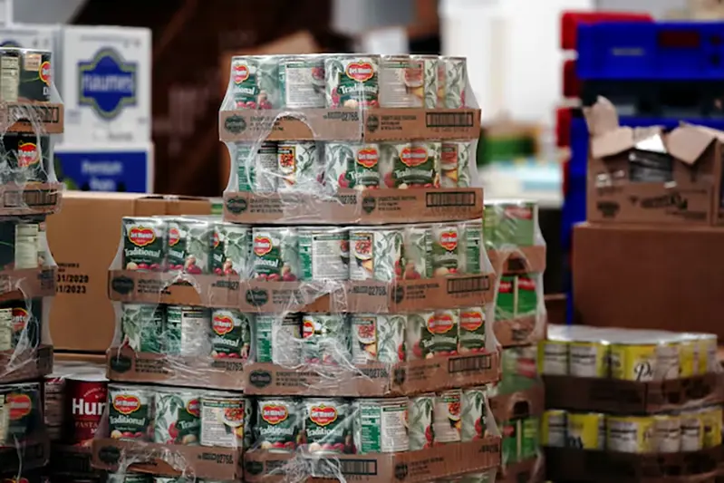 Del Monte canned tomatoes are seen among other nonperishable goods inside the West CAP Food Pantry in Boyceville, Wisconsin, U.S., October 22, 2020. REUTERS/Bing Guan/File Photo