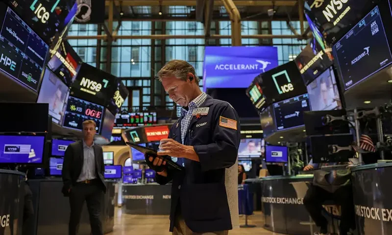 A trader works on the floor at the New York Stock Exchange (NYSE) in New York City, U.S., July 25, 2025. REUTERS/Jeenah Moon/File photo