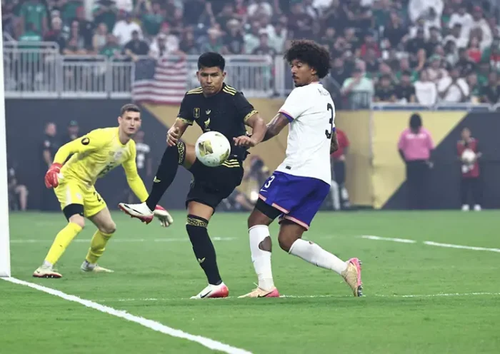 Mexico defender Jesus Gallardo (23) battles for the ball with United States defender Chris Richards (3) in front of United States goalkeeper Matthew Freese (25) in the second half during the 2025 Gold Cup Final at NRG Stadium. Mandatory Credit: Kevin Jairaj-Imagn Image