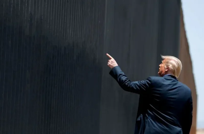 TOPSHOT - US President Donald Trump participates in a ceremony commemorating the 200th mile of border wall at the international border with Mexico in San Luis, Arizona, June 23, 2020. (Photo by SAUL LOEB / AFP) (Photo by SAUL LOEB/AFP via Getty Images)