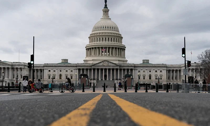 WASHINGTON, DC - DECEMBER 31: Clouds pass overt the Capitol Dome as the Senate resumes debate on overriding the veto of the National Defense Authorization Act (NDAA) on December 31, 2020 in Washington, DC. Senator Bernie Sanders (I-VT) is filibustering the NDAA, calling for a Senate vote on giving Americans $2,000 in direct payments for COVID-19 relief. (Photo by Joshua Roberts/Getty Images)