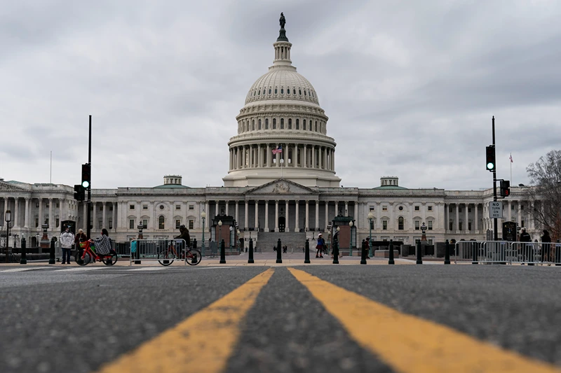 WASHINGTON, DC - DECEMBER 31: Clouds pass overt the Capitol Dome as the Senate resumes debate on overriding the veto of the National Defense Authorization Act (NDAA) on December 31, 2020 in Washington, DC. Senator Bernie Sanders (I-VT) is filibustering the NDAA, calling for a Senate vote on giving Americans $2,000 in direct payments for COVID-19 relief. (Photo by Joshua Roberts/Getty Images)