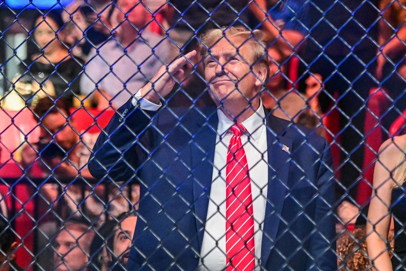 TOPSHOT - Former US President Donald Trump attends the Ultimate Fighting Championship (UFC) 299 mixed martial arts event at the Kaseya Center in Miami, Florida on March 9, 2024. (Photo by GIORGIO VIERA / AFP) (Photo by GIORGIO VIERA/AFP via Getty Images)