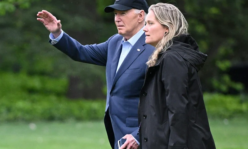 US President Joe Biden and Deputy Chief of Staff Annie Tomasini make their way to board Marine One from the South Lawn of the White House, in Washington, DC, on April 19, 2024, as they depart for Wilmington, Delaware. (Photo by Mandel NGAN / AFP) (Photo by MANDEL NGAN/AFP via Getty Images)