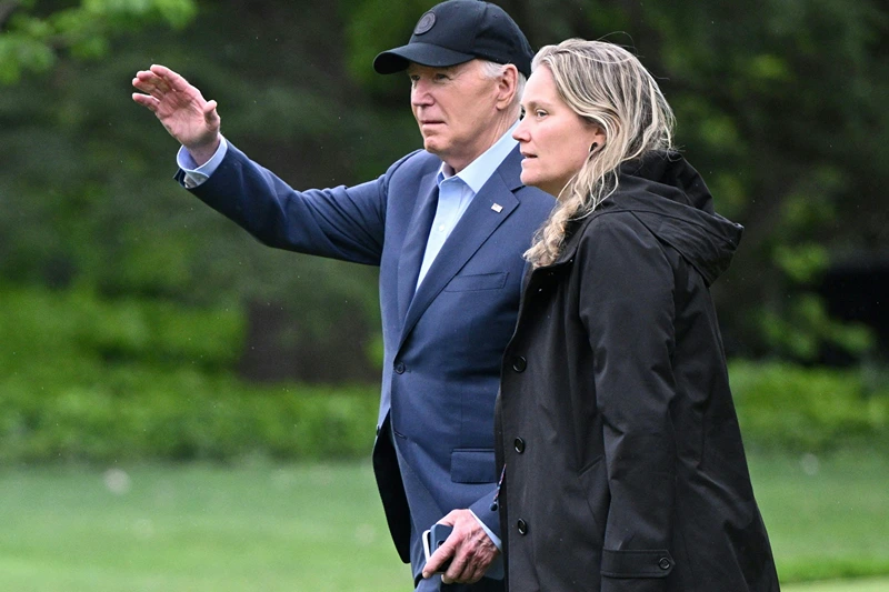 US President Joe Biden and Deputy Chief of Staff Annie Tomasini make their way to board Marine One from the South Lawn of the White House, in Washington, DC, on April 19, 2024, as they depart for Wilmington, Delaware. (Photo by Mandel NGAN / AFP) (Photo by MANDEL NGAN/AFP via Getty Images)