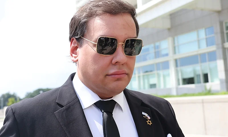 WEST ISLIP, NEW YORK - AUGUST 19: Former U.S. Rep. George Santos arrives for a court hearing at U.S. District Court Eastern District of New York Long Island Courthouse on August 19, 2024 in West Islip, New York. Santos is expected to plead guilty to federal charges relating to fraudulent activity in his 2022 House campaign just weeks before his federal trial began. Santos was expelled from Congress in 2023 becoming the sixth member in the chamber’s history to be ousted by colleagues. (Photo by Michael M. Santiago/Getty Images)