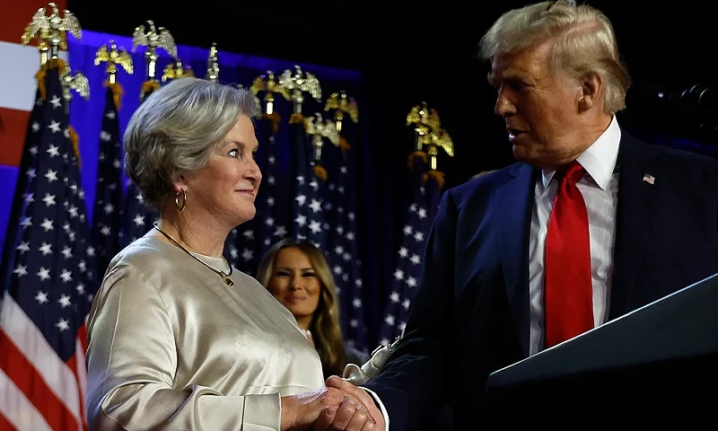 WEST PALM BEACH, FLORIDA - NOVEMBER 05: Republican presidential nominee, former U.S. President Donald Trump praises his campaign senior advisor Susie Wiles during an election night event at the Palm Beach Convention Center on November 06, 2024 in West Palm Beach, Florida. Americans cast their ballots today in the presidential race between Republican nominee former President Donald Trump and Vice President Kamala Harris, as well as multiple state elections that will determine the balance of power in Congress. (Photo by Chip Somodevilla/Getty Images)