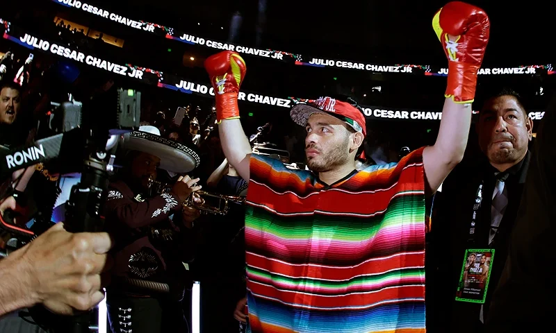 ANAHEIM, CALIFORNIA - JUNE 28: Julio Cesar Chavez Jr. reacts as he walks to the ring for his fight against Jake Paul during a Cruiserweight fight at Honda Center on June 28, 2025 in Anaheim, California. (Photo by Harry How/Getty Images)