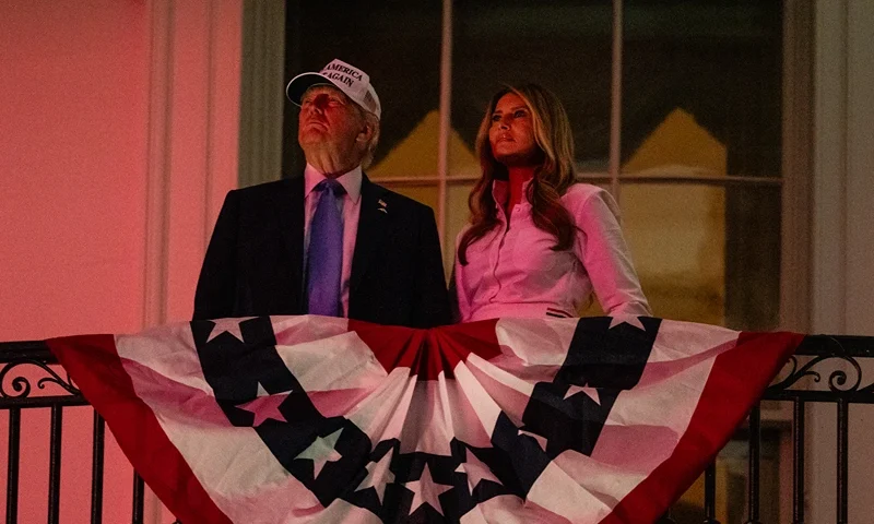 WASHINGTON, DC - JULY 04: President Donald Trump and First Lady Melania Trump watch fireworks during a Fourth of July celebration at the White House on July 4, 2025 in Washington, DC. The Independence Day celebrations come a day after the House of Representatives passed President Donald Trump's "Big, Beautiful Bill," which he signed earlier in the day. (Photo by Eric Lee/Getty Images)