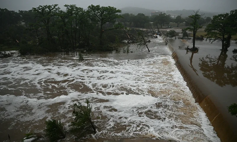 A photo shows flooding caused by a flash flood at the Guadalupe River in Kerrville, Texas, on July 5, 2025. Rescuers were desperately searching for at least 20 girls missing from a riverside summer camp, officials said on July 5, after torrential rains caused a "catastrophic" flash flood that killed at least 24 people as it swept through south-central Texas. (Photo by RONALDO SCHEMIDT / AFP) (Photo by RONALDO SCHEMIDT/AFP via Getty Images)