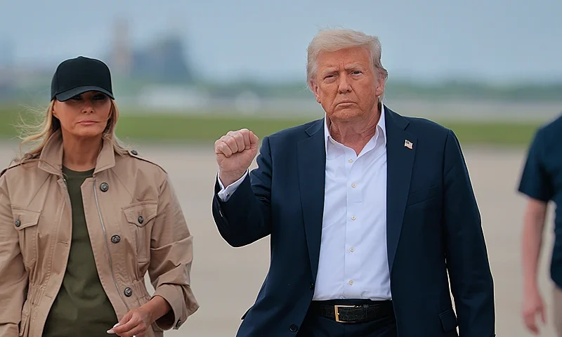 SAN ANTONIO, TEXAS - JULY 11: President Donald Trump and first lady Melania Trump arrive at Lackland Air Force Base before heading to Kerrville, Texas where they plan to visit with state and local leaders, first responders and victims of last week's flash flooding on July 11, 2025 in San Antonio, Texas. Trump traveled to Texas one week after flash flooding along the Guadalupe River swept through cities, mobile home parks and summer camps, killing 120 people. Ninety-six of those killed were in Kerr County, where the toll includes at least 36 children.(Photo by Chip Somodevilla/Getty Images)