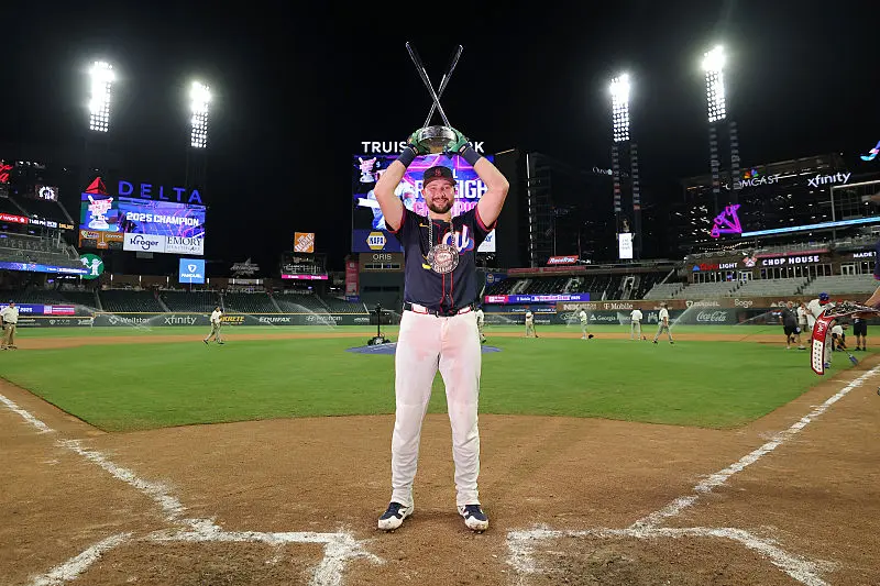 Cal Raleigh #29 of the Seattle Mariners poses with the trophy after winning the Home Run Derby at Truist Park on July 14, 2025 in Atlanta, Georgia. (Photo by Jamie Squire/Getty Images)
