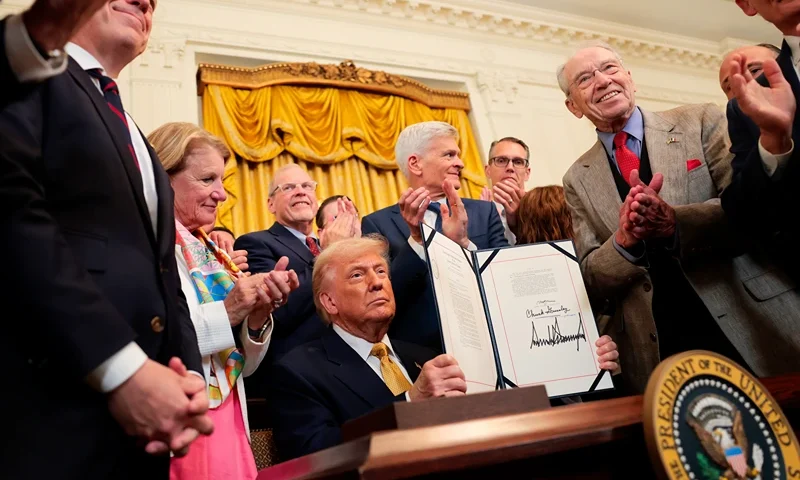 U.S. President Donald Trump displays a signed bill during an event in the East Room of the White House on July 16, 2025 in Washington, DC. President Trump signed the HALT Fentanyl Act, which aims to permanently classify all fentanyl-related substances as schedule I controlled substances and aid law enforcement in prosecuting trafficking and manufacturing offenses. (Photo by Anna Moneymaker/Getty Images)