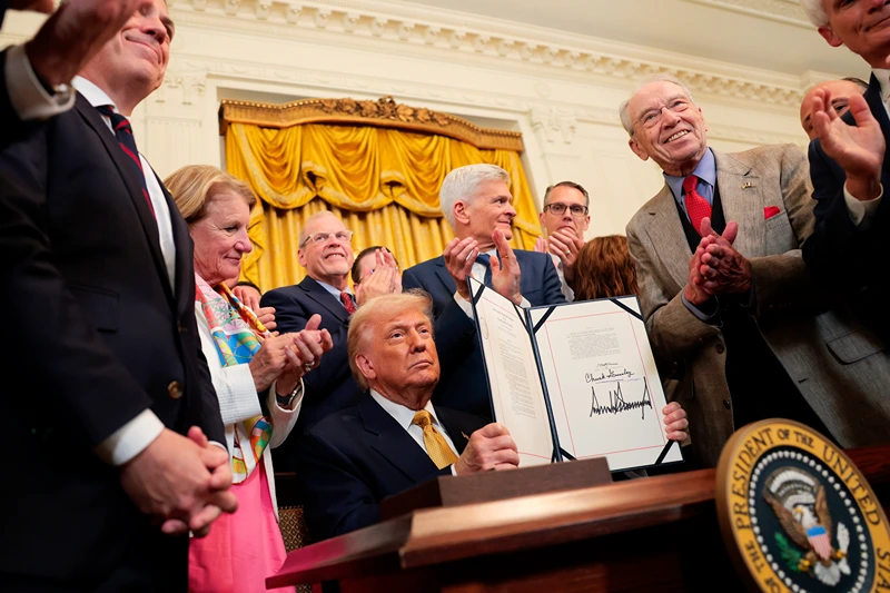 U.S. President Donald Trump displays a signed bill during an event in the East Room of the White House on July 16, 2025 in Washington, DC. President Trump signed the HALT Fentanyl Act, which aims to permanently classify all fentanyl-related substances as schedule I controlled substances and aid law enforcement in prosecuting trafficking and manufacturing offenses. (Photo by Anna Moneymaker/Getty Images)