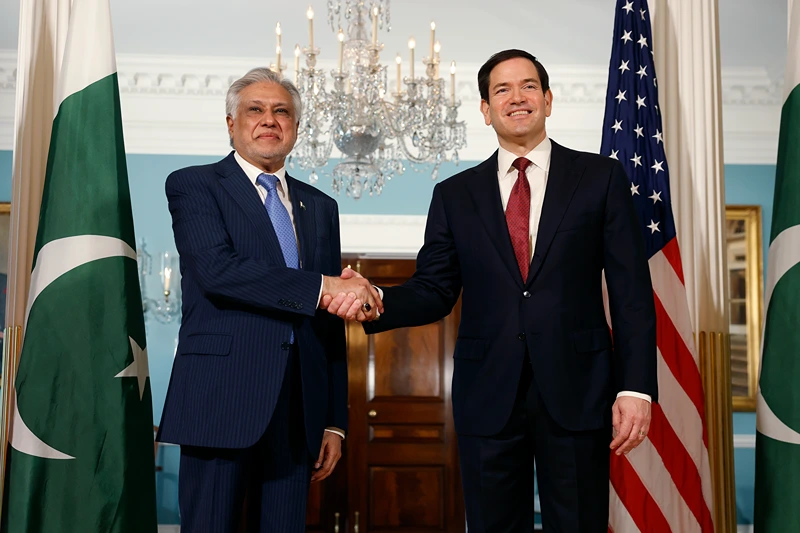 U.S. Secretary of State Marco Rubio (R) greets Pakistani Deputy Prime Minister and Foreign Minister Ishaq Dar at the Department of State on July 25, 2025 in Washington, DC. The two leaders met to discuss enhanced cooperation in trade, counterterrorism and regional peace. (Photo by Kevin Dietsch/Getty Images)