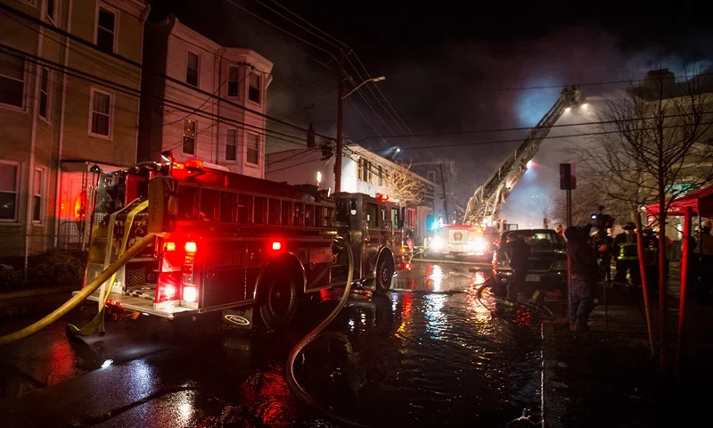 CAMBRIDGE, MA - DECEMBER 03: Firefighters work to contain a 10-alarm fire near Berkshire St. on December 3, 2016 in Cambridge, Massachusetts. According to reports, the fire has spread to as many as seven buildings with two police officers and a firefighter injured during the blaze. (Photo by Scott Eisen/Getty Images)