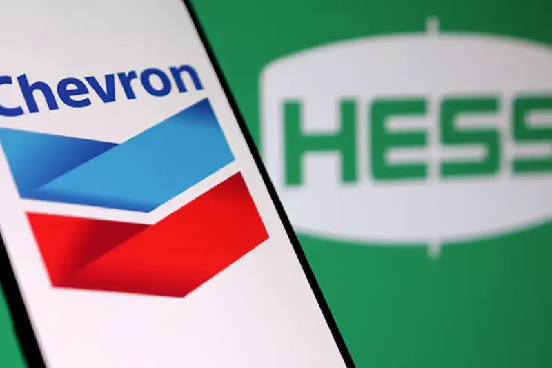 Chevron and Hess logos are seen in this illustration taken, October 23, 2023. REUTERS/Dado Ruvic/Illustration/File Photo