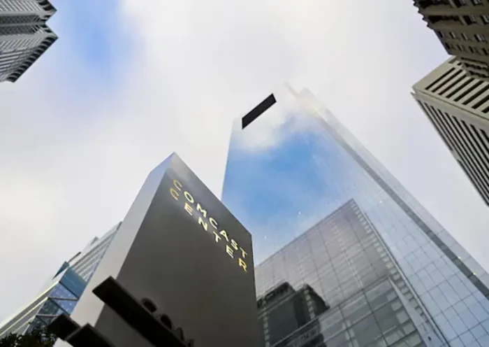 A view shows a signage at the corporate headquarters of Comcast, which announced plans to spin-off the bulk of its fading NBCUniversal cable TV networks, including MSNBC and CNBC, in Philadelphia, Pennsylvania, U.S. November 20, 2024.