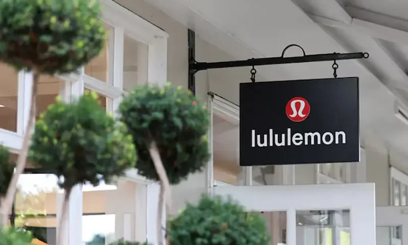 A logo is displayed above a Lululemon outlet retail store at Bicester Village in Oxfordshire, Britain, August 21, 2024. REUTERS/Hollie Adams/File Photo