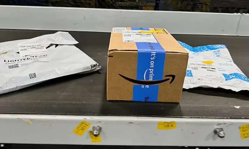 Packages are transported on a conveyor belt at the Amazon warehouse on Prime Day, in Melville, New York, U.S., July 11, 2023. REUTERS/Soren Larson/File Photo