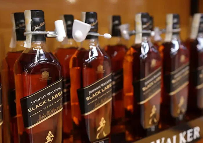 Johnnie Walker bottles are displayed on a shelf in a supermarket in Sarajevo, Bosnia and Herzegovina, October 29, 2024. REUTERS/Dado Ruvic/File Photo