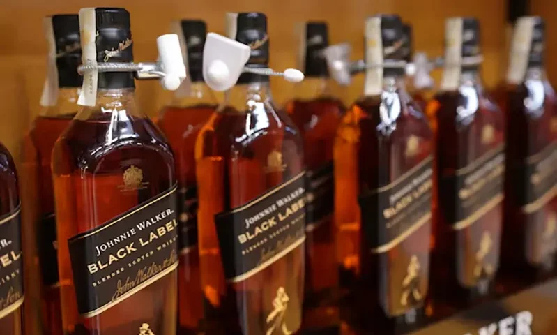 Johnnie Walker bottles are displayed on a shelf in a supermarket in Sarajevo, Bosnia and Herzegovina, October 29, 2024. REUTERS/Dado Ruvic/File Photo