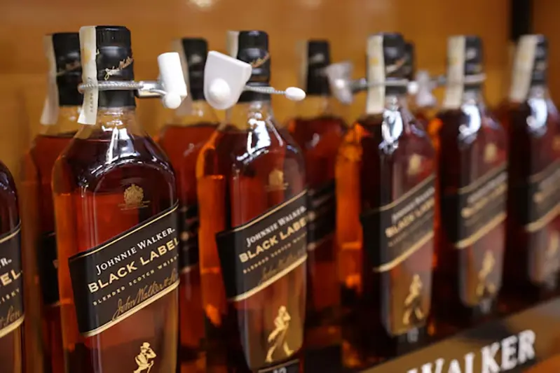 Johnnie Walker bottles are displayed on a shelf in a supermarket in Sarajevo, Bosnia and Herzegovina, October 29, 2024. REUTERS/Dado Ruvic/File Photo