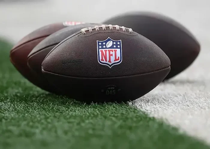 General view of the National Football League logo on footballs prior to the game between the New York Jets and the New York Giants at MetLife Stadium. Mandatory Credit: Rich Barnes-Imagn Images/File Photo