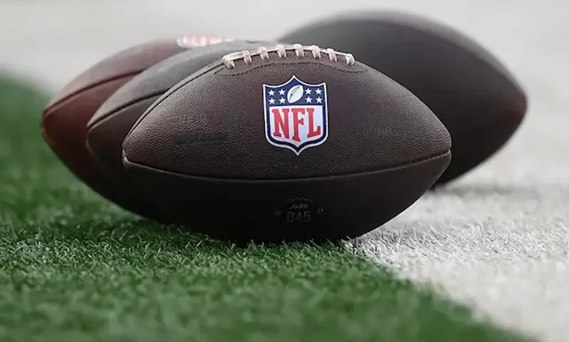 General view of the National Football League logo on footballs prior to the game between the New York Jets and the New York Giants at MetLife Stadium. Mandatory Credit: Rich Barnes-Imagn Images/File Photo