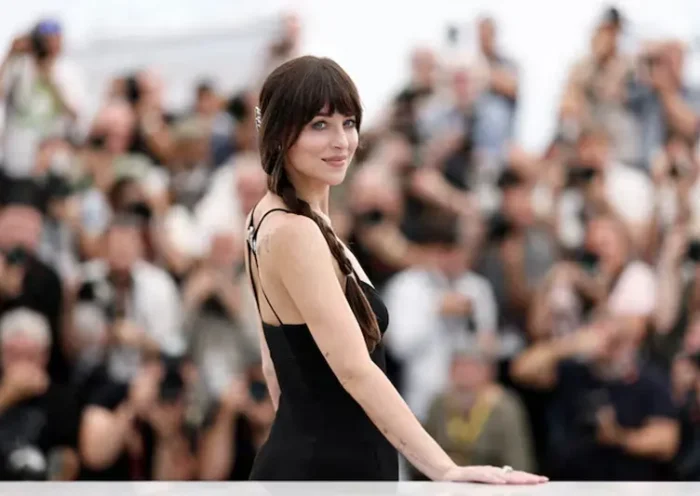 Cast member Dakota Johnson poses during a photocall for film "Splitsville" presented as part of Cannes Premiere at the 78th Cannes Film Festival in Cannes, France, May 19, 2025. REUTERS/Benoit Tessier/File Photo