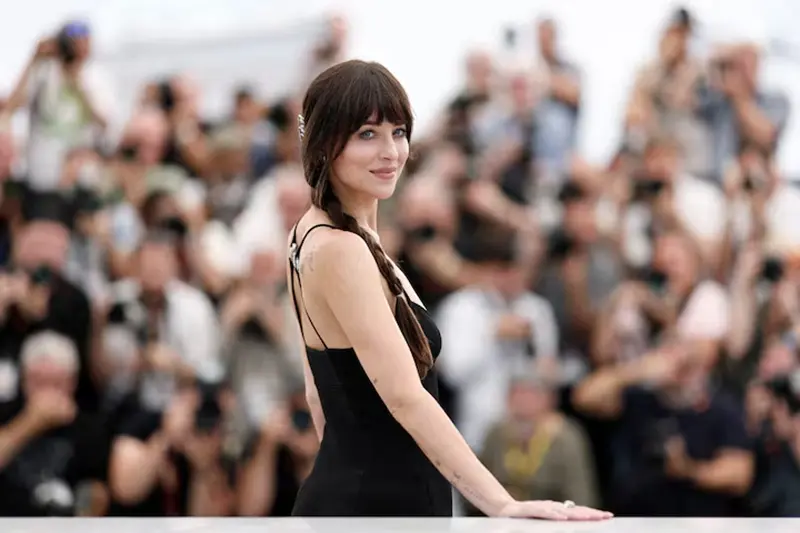 Cast member Dakota Johnson poses during a photocall for film "Splitsville" presented as part of Cannes Premiere at the 78th Cannes Film Festival in Cannes, France, May 19, 2025. REUTERS/Benoit Tessier/File Photo