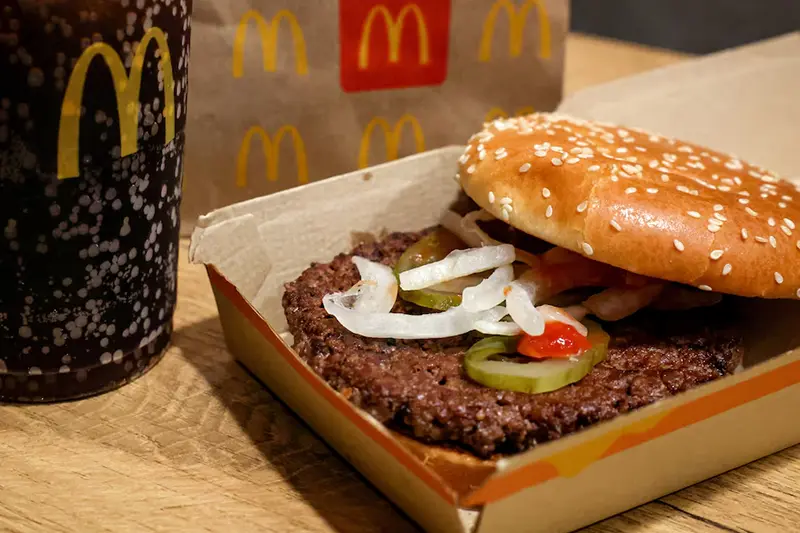 A McDonald's Quarter Pounder hamburger and coke, are seen in an illustration picture taken in New York City, U.S., October 24, 2024. REUTERS/Brendan McDermid/File photo