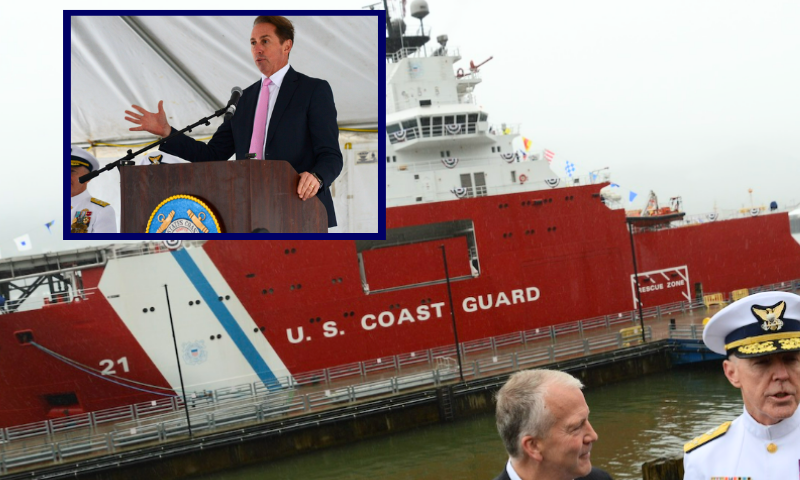 (Background) U.S. Sen. Dan Sullivan stands with acting Coast Guard Commandant Adm. Kevin Lunday during the commissioning ceremony for the Coast Guard icebreaker Storis on Sunday, Aug. 10, 2025, in Juneau, Alaska. (Photo by James Brooks/Alaska Beacon) / (L) Troy Edgar, deputy secretary of the U.S. Department of Homeland Security, speaks during the commissioning ceremony for the Coast Guard icebreaker Storis. (Photo by James Brooks/Alaska Beacon)
