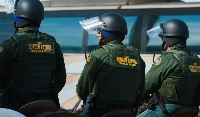 TOPSHOT - US Customs and Border Protection agents participate in a training exercise at a vehicle entry point along the border with Mexico on November 5, 2018, in Hidalgo, Texas. - Around 4,800 US soldiers were deployed to the border with Mexico, the Pentagon announced, saying it could not give a price tag for the operation Democrats decry as political maneuvring from President Donald Trump. (Photo by Andrew Cullen / AFP) (Photo credit should read ANDREW CULLEN/AFP via Getty Images)