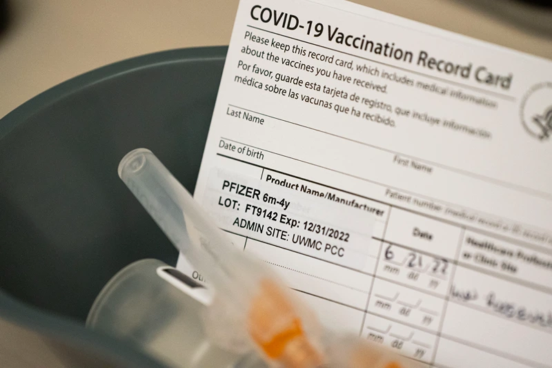 Doses of the Pfizer Covid-19 vaccine and vaccination record cards await pediatric patients at UW Medical Center - Roosevelt on June 21, 2022 in Seattle, Washington. Covid-19 vaccinations for children younger than 5 began today across the U.S. (Photo by David Ryder/Getty Images)Washington. Covid-19 vaccinations for children younger than 5 began today across the U.S. (Photo by David Ryder/Getty Images)