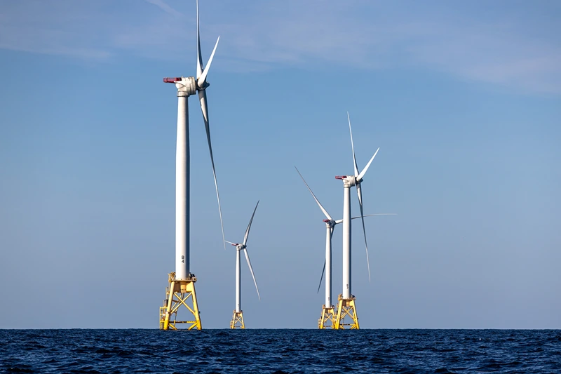 Wind turbines generate electricity at the Block Island Wind Farm on July 07, 2022 near Block Island, Rhode Island. The first commercial offshore wind farm in the United States is located 3.8 miles from Block Island, Rhode Island in the Atlantic Ocean. The five-turbine, 30 MW project was developed by Deepwater Wind and began operations in December, 2016 at a cost of nearly $300 million. (Photo by John Moore/Getty Images)