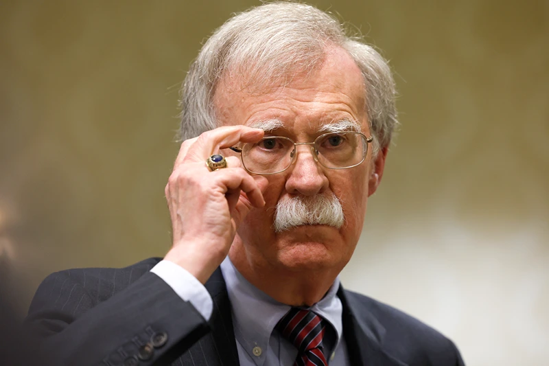 Former National Security Adviser John Bolton speaks to reporters after speaking in a panel hosted by the National Council of Resistance of Iran – U.S. Representative Office (NCRI-US) at the Willard InterContinental Hotel on August 17, 2022 in Washington, DC. The NCRI-US held the panel to mark the 20th anniversary of their first press conference on the perceived threat of Iran’s nuclear weapons program. Recently the U.S. Justice Department announced charges against an Iranian operative for a plot to murder John Bolton. (Photo by Anna Moneymaker/Getty Images)