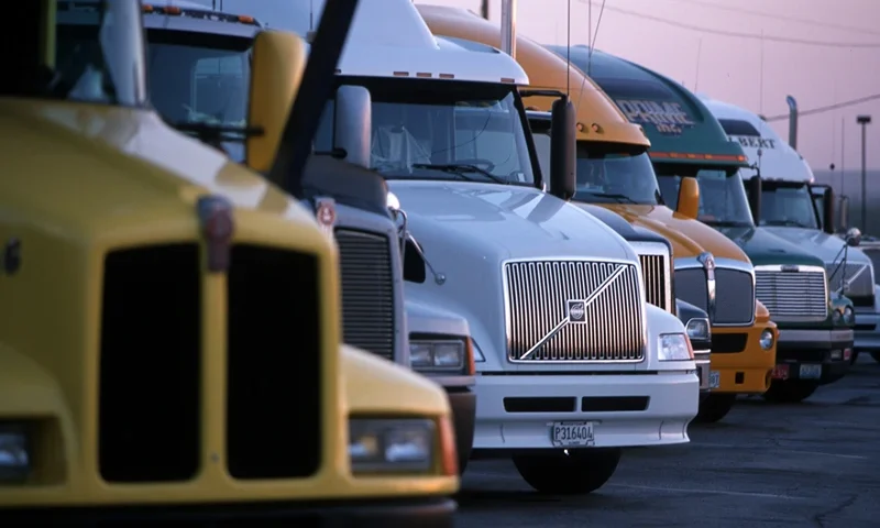 370225 03: Tractor-trailer rigs are parked at the Petro truck stop May 29, 2000in El Paso, TX. Many of the rigs now have modern wireless communications as well as cable television, refrigerators, double bunk beds, and microwave ovens. In the last few years trucks have become more like a home/office on the road. (Photo by Joe Raedle/Newsmakers)